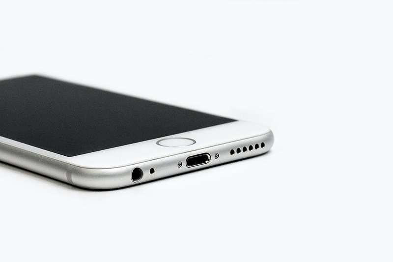 How do I connect my hearing aids to my iPhone